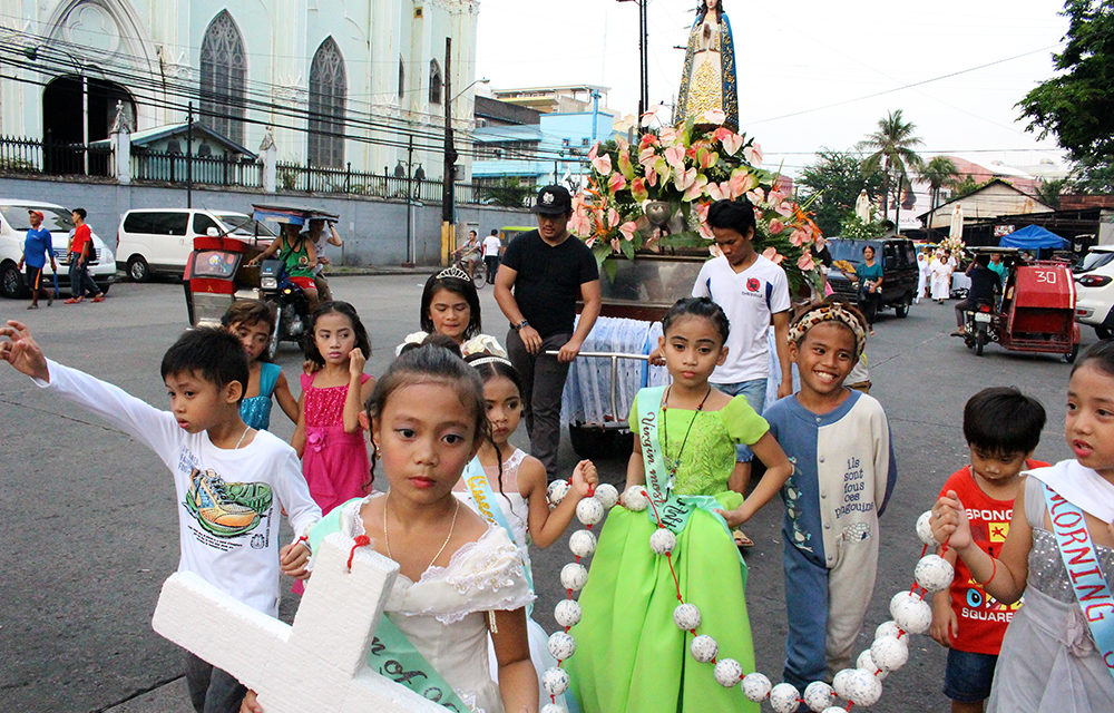 Quiapo shrine celebrates santacruzan with street kids