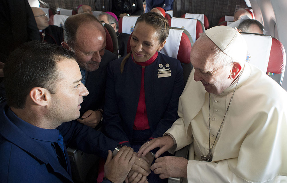 Pope marries couple on flight during Chilean trip