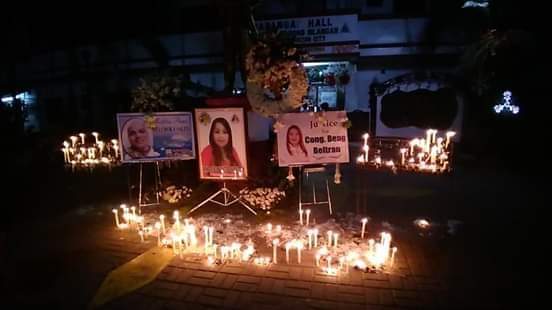 Parish holds candle-lighting for slain barangay chair