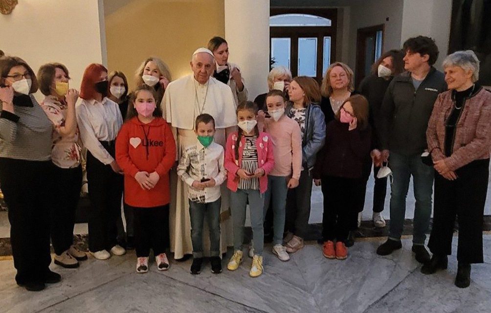 Pope Francis greets Ukraine war refugees before first papal flight of 2022
